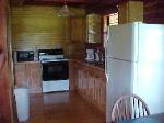Cabin kitchen with pine floors